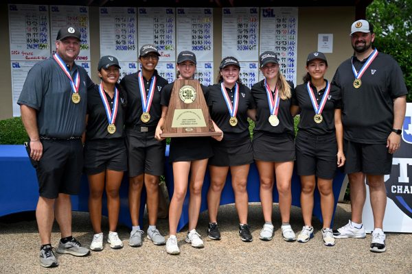 The girls golf team receive their trophy after winning State on May 7. 
(From Left-to-Right) Coach Aaron Ford, Danica Lundgren, Swetha Sathish, Addison Bandelier, Eden McSpadden, Michaela Partridge, Coach Jaime Sierra