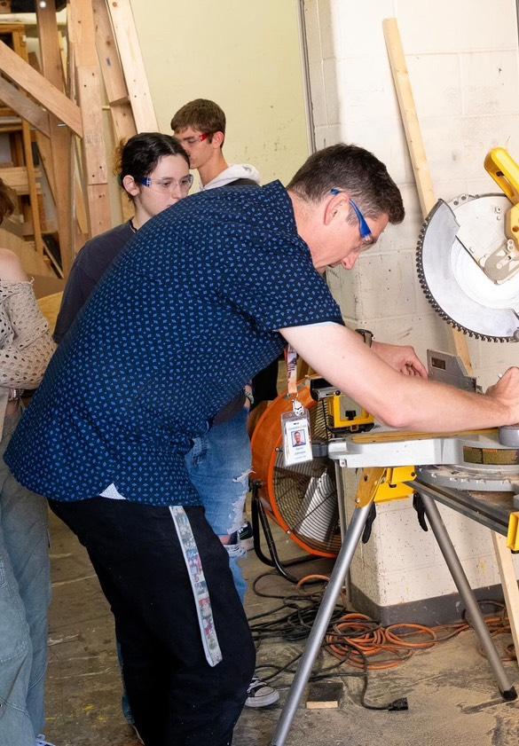 New technical theater director, Aaron Johnson, and the crew work on the set of Chicago, their upcoming play. Chicago will be performed on Nov 1 and 2.