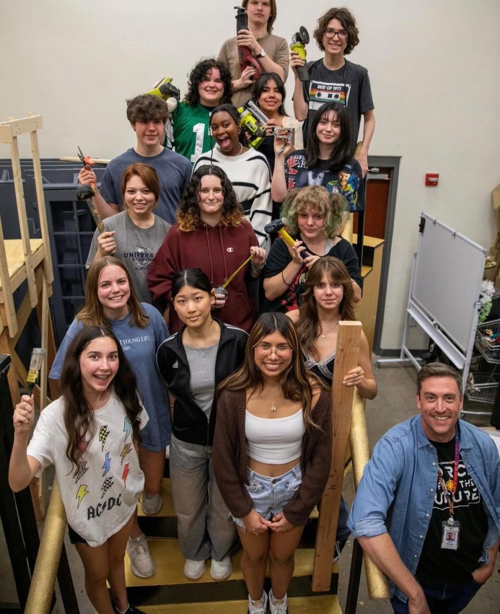 New technical theater director, Aaron Johnson, and the crew work on the set of Chicago, their upcoming play. Chicago will be performed on Nov 1 and 2.