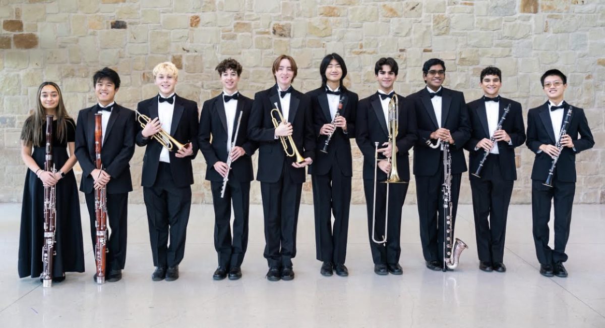 All-State Wind and Percussion students pose for a photo with their instruments. They will travel to San Antonio in February. 