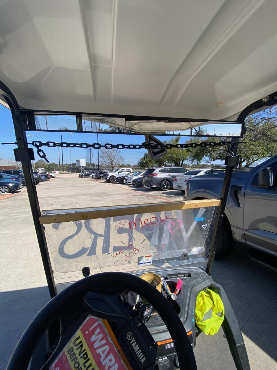 With the markers in Foster's golf cart, students often leave cheerful or humorous messages on his windshield.